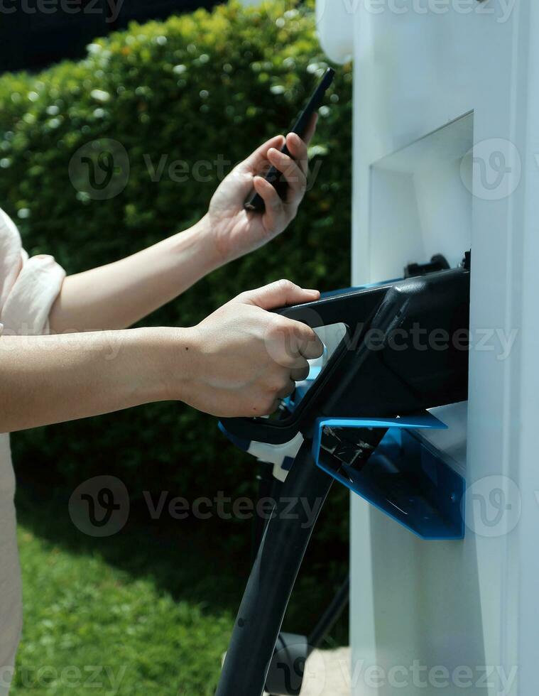 EV charging station for electric car in concept of green energy and eco power produced from sustainable source to supply to charger station in order to reduce CO2 emission . photo