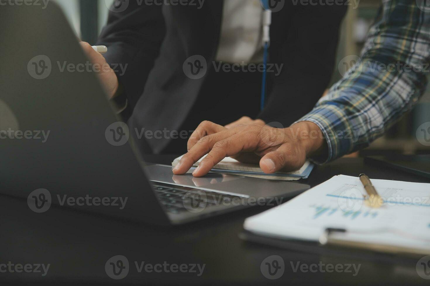 Audit concept,Administrator business man financial inspector and secretary making report calculating balance. Internal Revenue Service checking document. photo