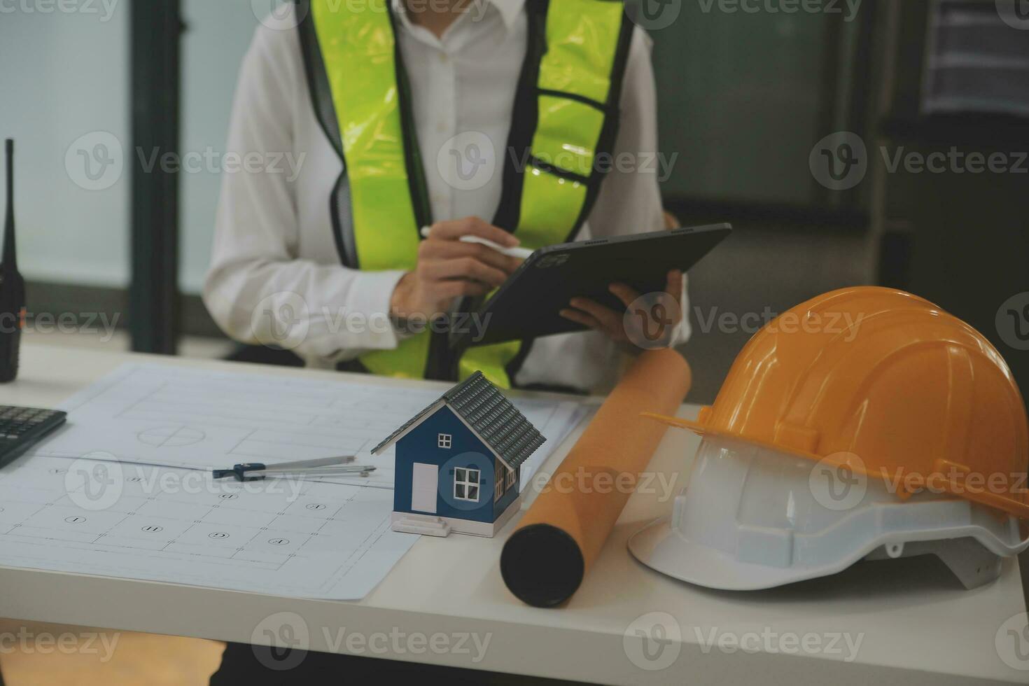 Engineer Teamwork Meeting, Drawing working on blueprint meeting for project working with partner on model building and engineering tools in working site, Construction and structure concept. photo
