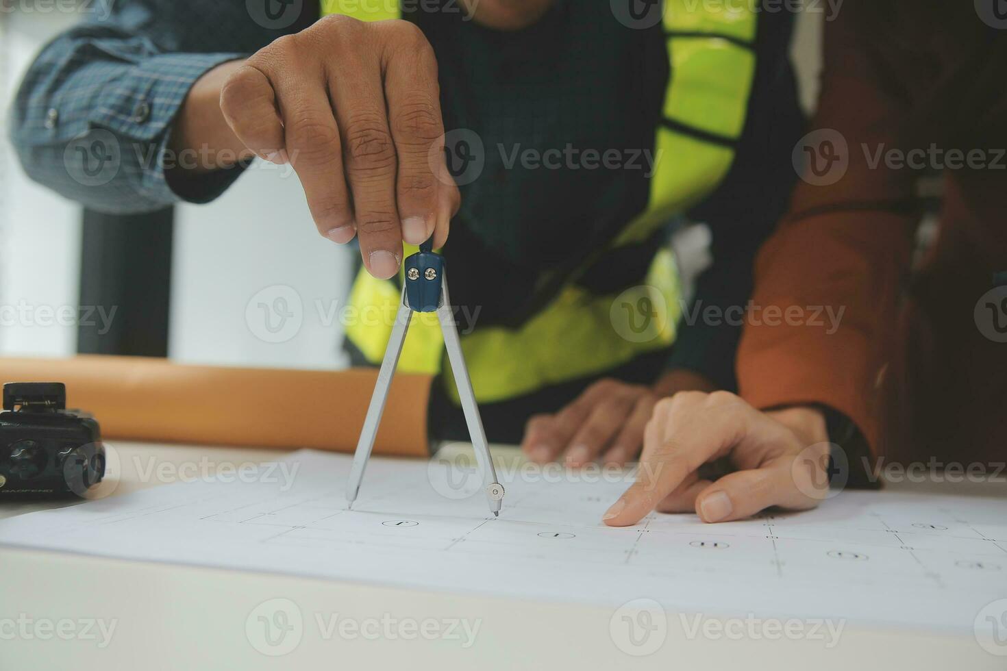 Engineer Teamwork Meeting, Drawing working on blueprint meeting for project working with partner on model building and engineering tools in working site, Construction and structure concept. photo