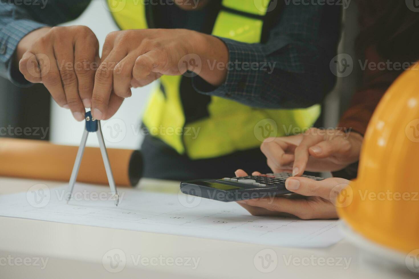 Engineer Teamwork Meeting, Drawing working on blueprint meeting for project working with partner on model building and engineering tools in working site, Construction and structure concept. photo