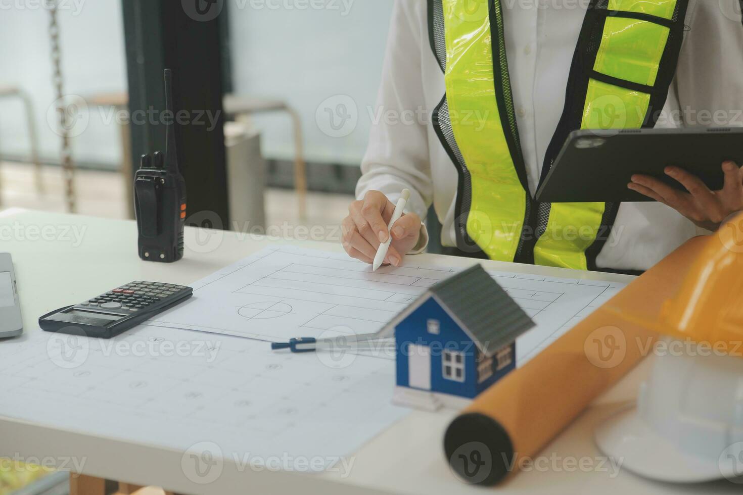 Engineer Teamwork Meeting, Drawing working on blueprint meeting for project working with partner on model building and engineering tools in working site, Construction and structure concept. photo