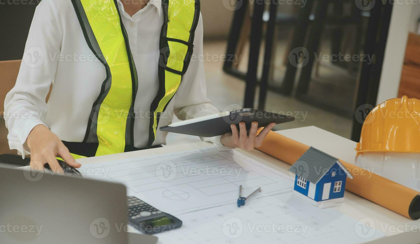 Engineer Teamwork Meeting, Drawing working on blueprint meeting for project working with partner on model building and engineering tools in working site, Construction and structure concept. photo