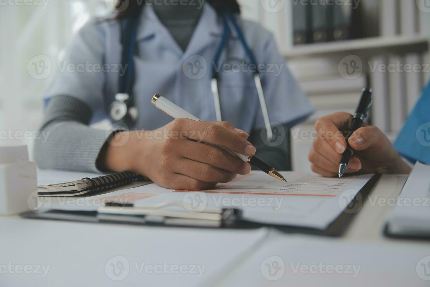 Doctors, nurse or laptop in night teamwork, medical research or surgery planning in wellness hospital. Talking, thinking or healthcare women on technology for collaboration help or life insurance app photo