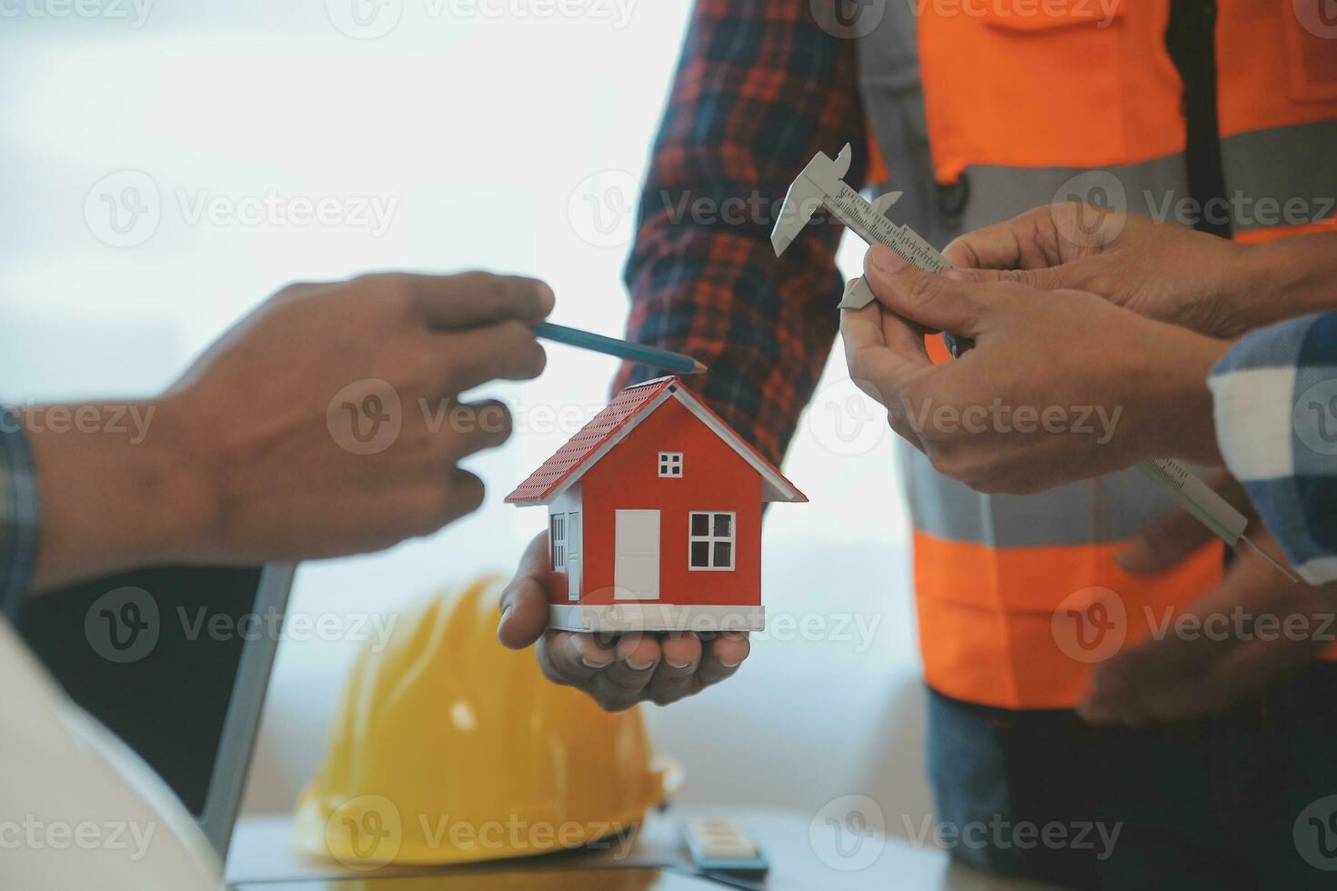 Construction and structure concept of Engineer or architect meeting for project working with partner and engineering tools on model building and blueprint in working site, contract for both companies. photo