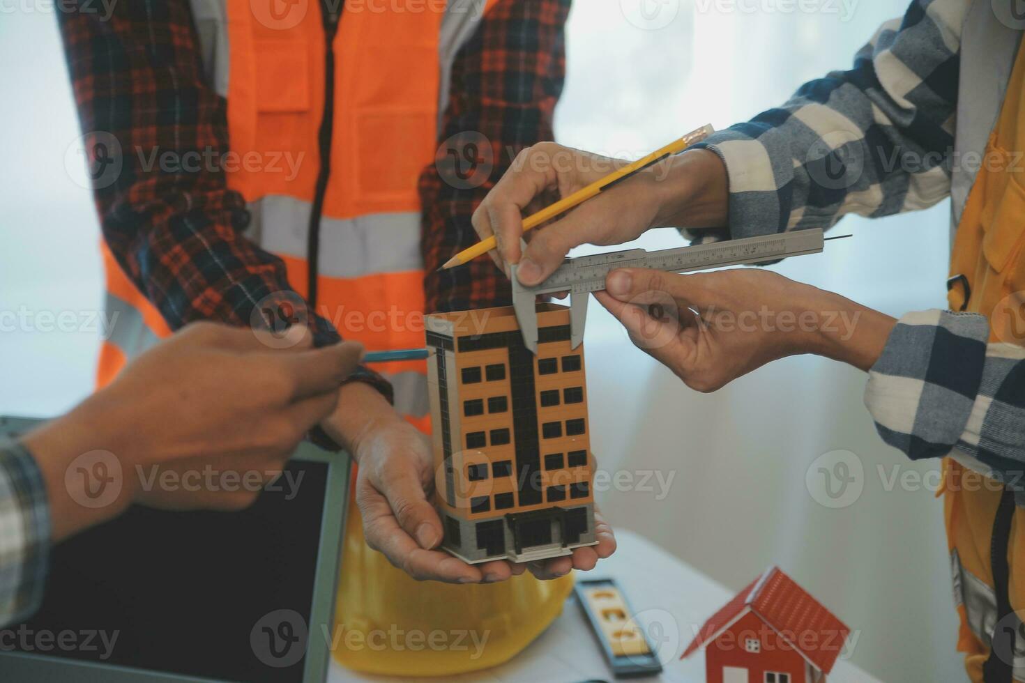 Construction and structure concept of Engineer or architect meeting for project working with partner and engineering tools on model building and blueprint in working site, contract for both companies. photo