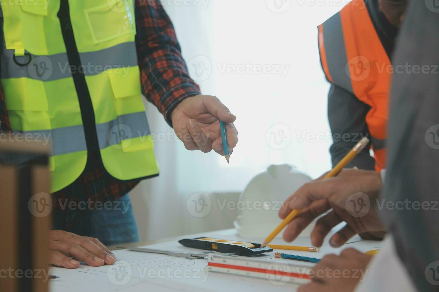 Construction and structure concept of Engineer or architect meeting for project working with partner and engineering tools on model building and blueprint in working site, contract for both companies. photo