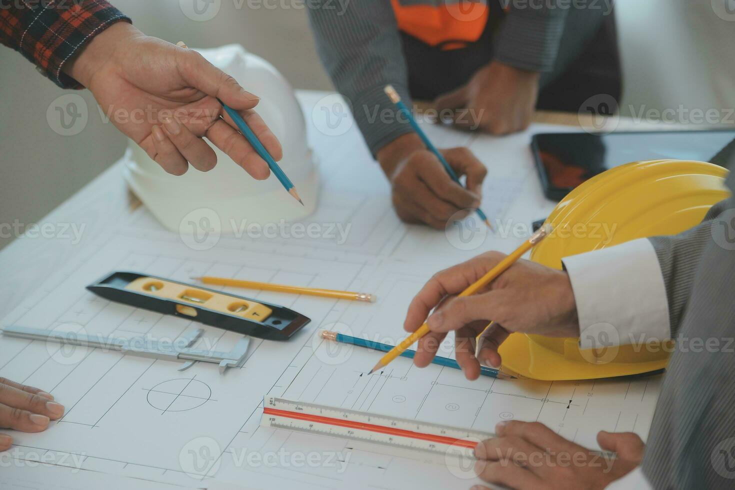 Construction and structure concept of Engineer or architect meeting for project working with partner and engineering tools on model building and blueprint in working site, contract for both companies. photo