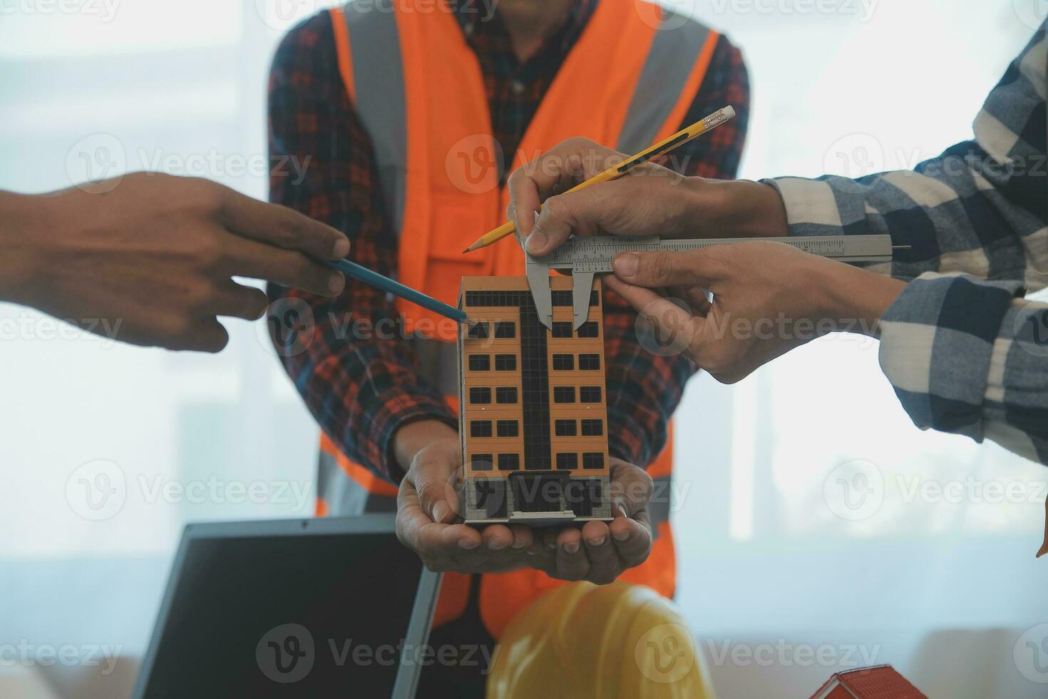 Construction and structure concept of Engineer or architect meeting for project working with partner and engineering tools on model building and blueprint in working site, contract for both companies. photo