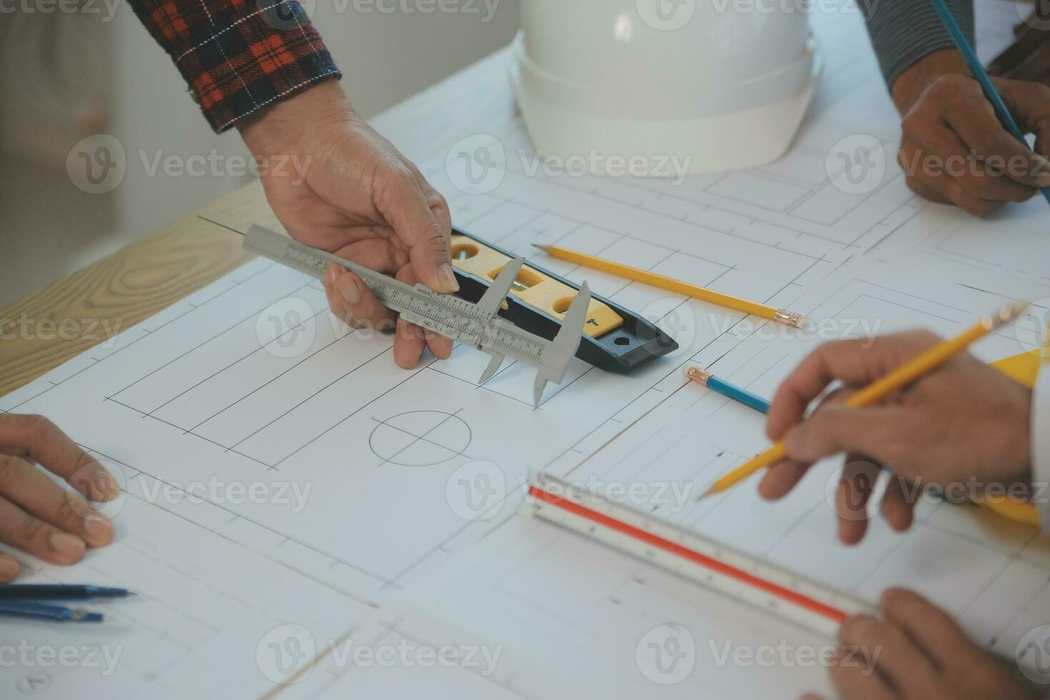 Construction and structure concept of Engineer or architect meeting for project working with partner and engineering tools on model building and blueprint in working site, contract for both companies. photo