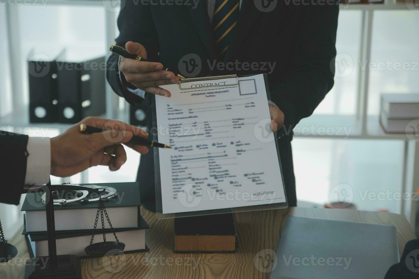 Consultation and conference of Male lawyers and professional businesswoman working and discussion having at law firm in office. Concepts of law, Judge gavel with scales of justice. photo