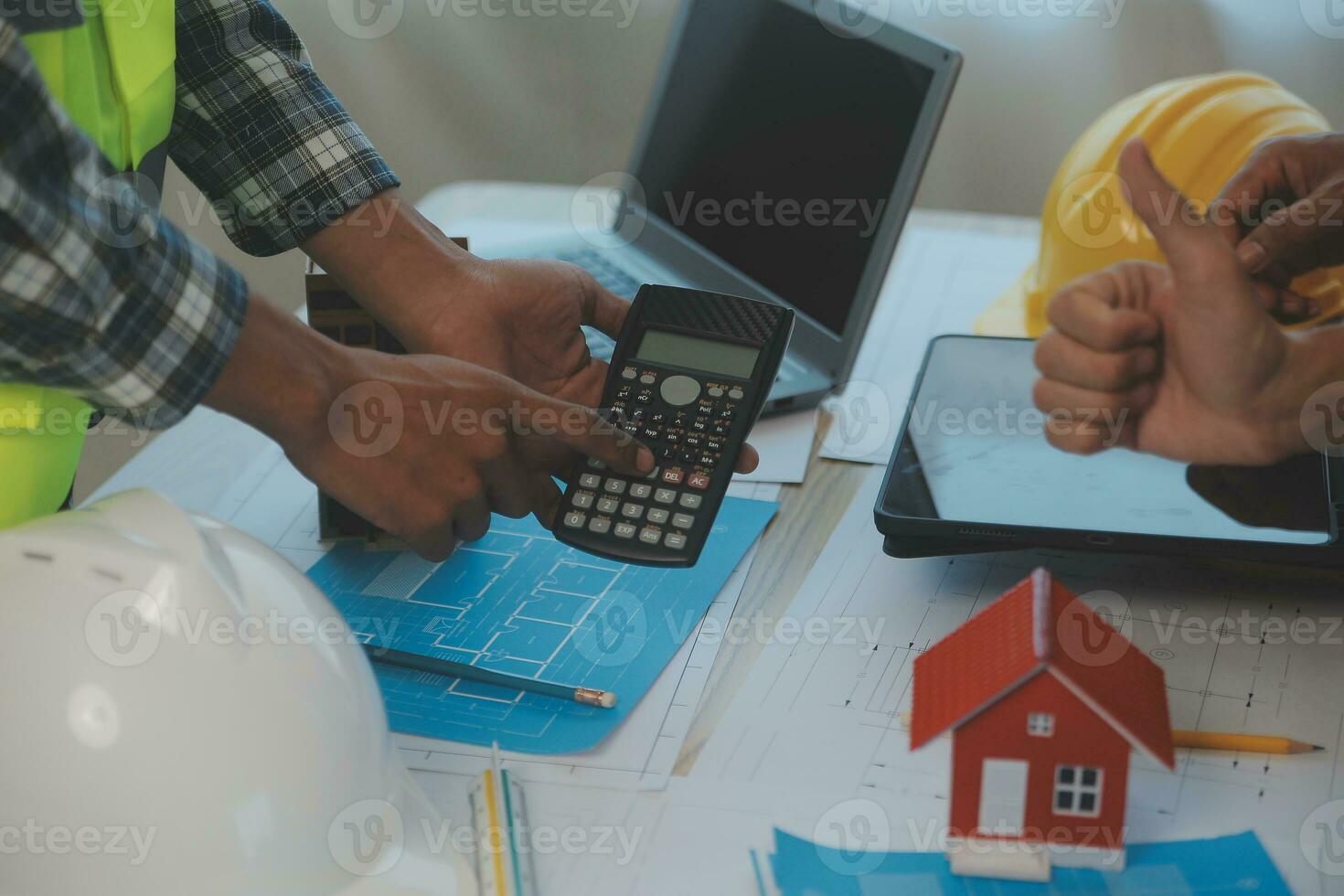 Construction and structure concept of Engineer or architect meeting for project working with partner and engineering tools on model building and blueprint in working site, contract for both companies. photo