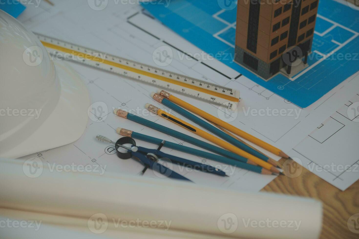 Construction and structure concept of Engineer or architect meeting for project working with partner and engineering tools on model building and blueprint in working site, contract for both companies. photo