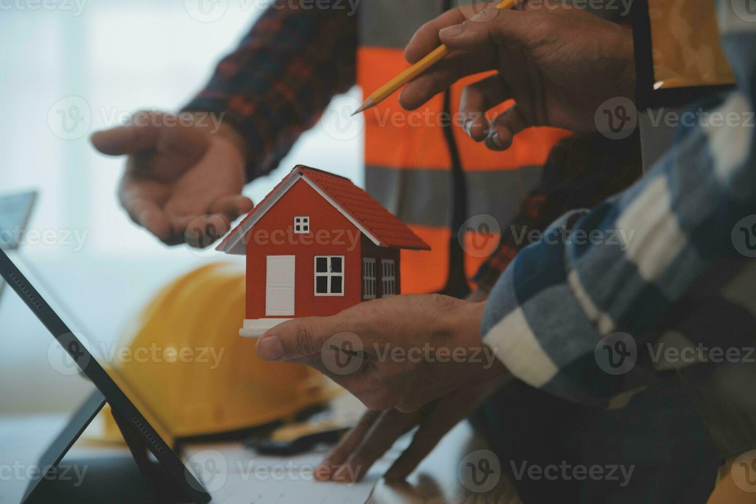 Construction and structure concept of Engineer or architect meeting for project working with partner and engineering tools on model building and blueprint in working site, contract for both companies. photo
