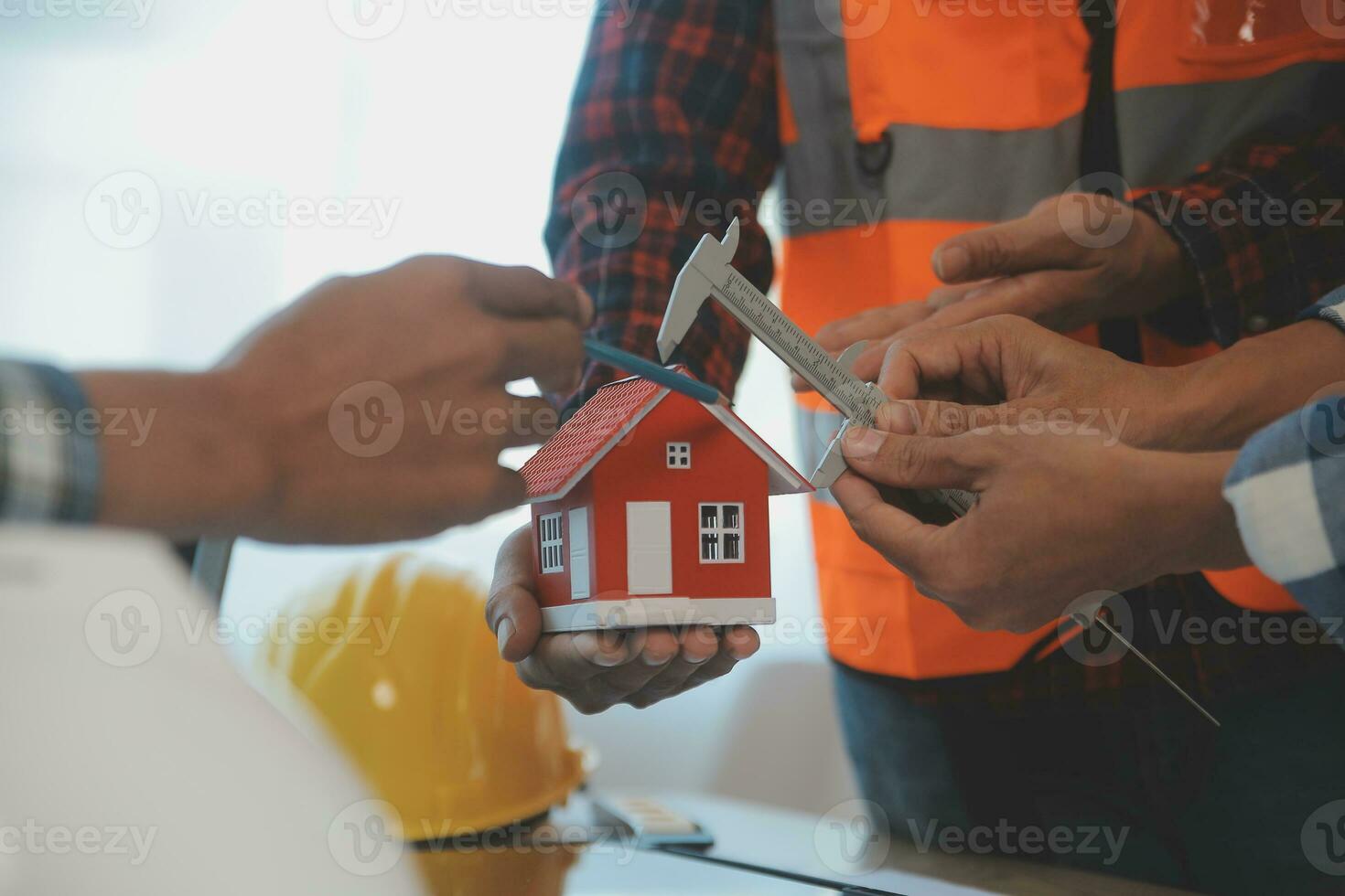 Construction and structure concept of Engineer or architect meeting for project working with partner and engineering tools on model building and blueprint in working site, contract for both companies. photo