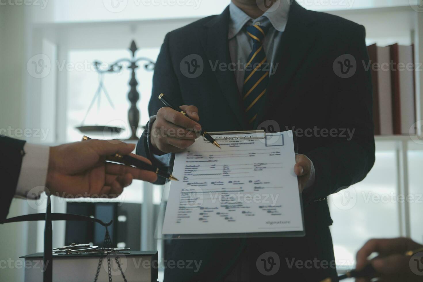 Consultation and conference of Male lawyers and professional businesswoman working and discussion having at law firm in office. Concepts of law, Judge gavel with scales of justice. photo