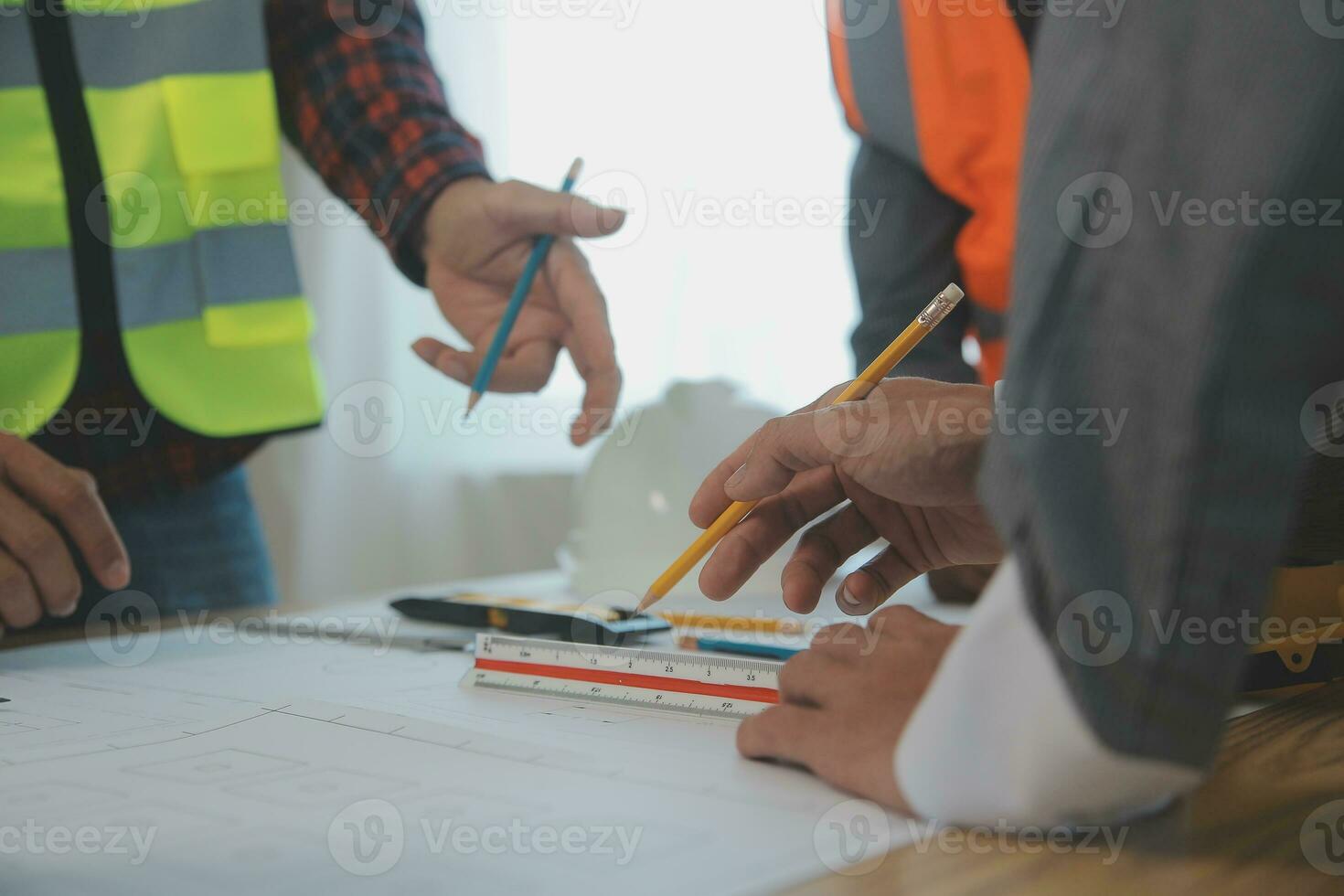Construction and structure concept of Engineer or architect meeting for project working with partner and engineering tools on model building and blueprint in working site, contract for both companies. photo