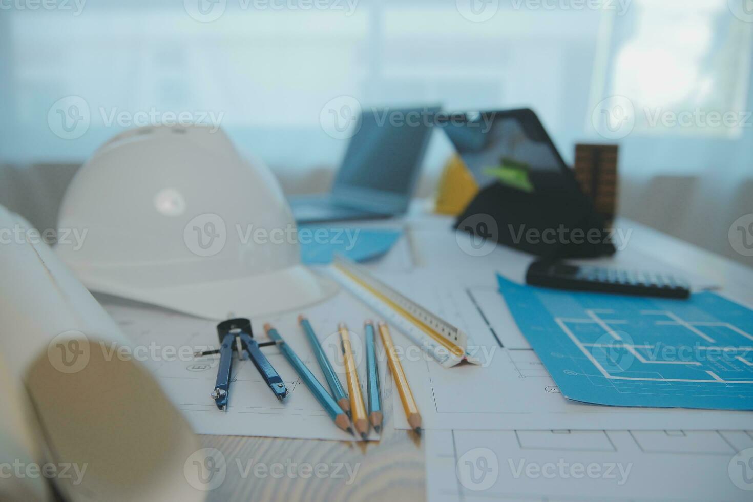 Construction and structure concept of Engineer or architect meeting for project working with partner and engineering tools on model building and blueprint in working site, contract for both companies. photo