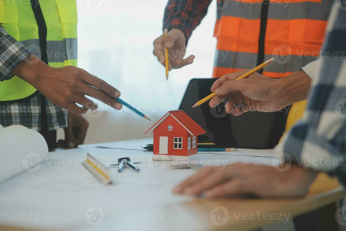 Construction and structure concept of Engineer or architect meeting for project working with partner and engineering tools on model building and blueprint in working site, contract for both companies. photo