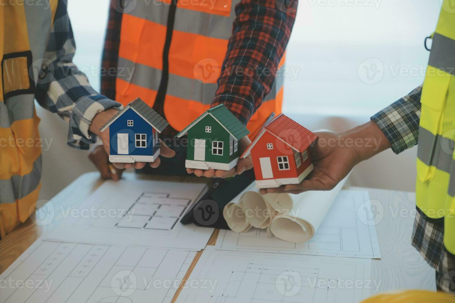 Construction and structure concept of Engineer or architect meeting for project working with partner and engineering tools on model building and blueprint in working site, contract for both companies. photo