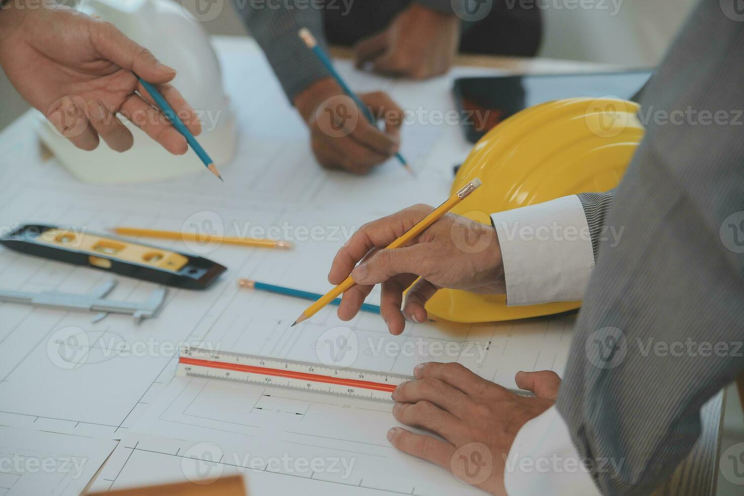 Construction and structure concept of Engineer or architect meeting for project working with partner and engineering tools on model building and blueprint in working site, contract for both companies. photo