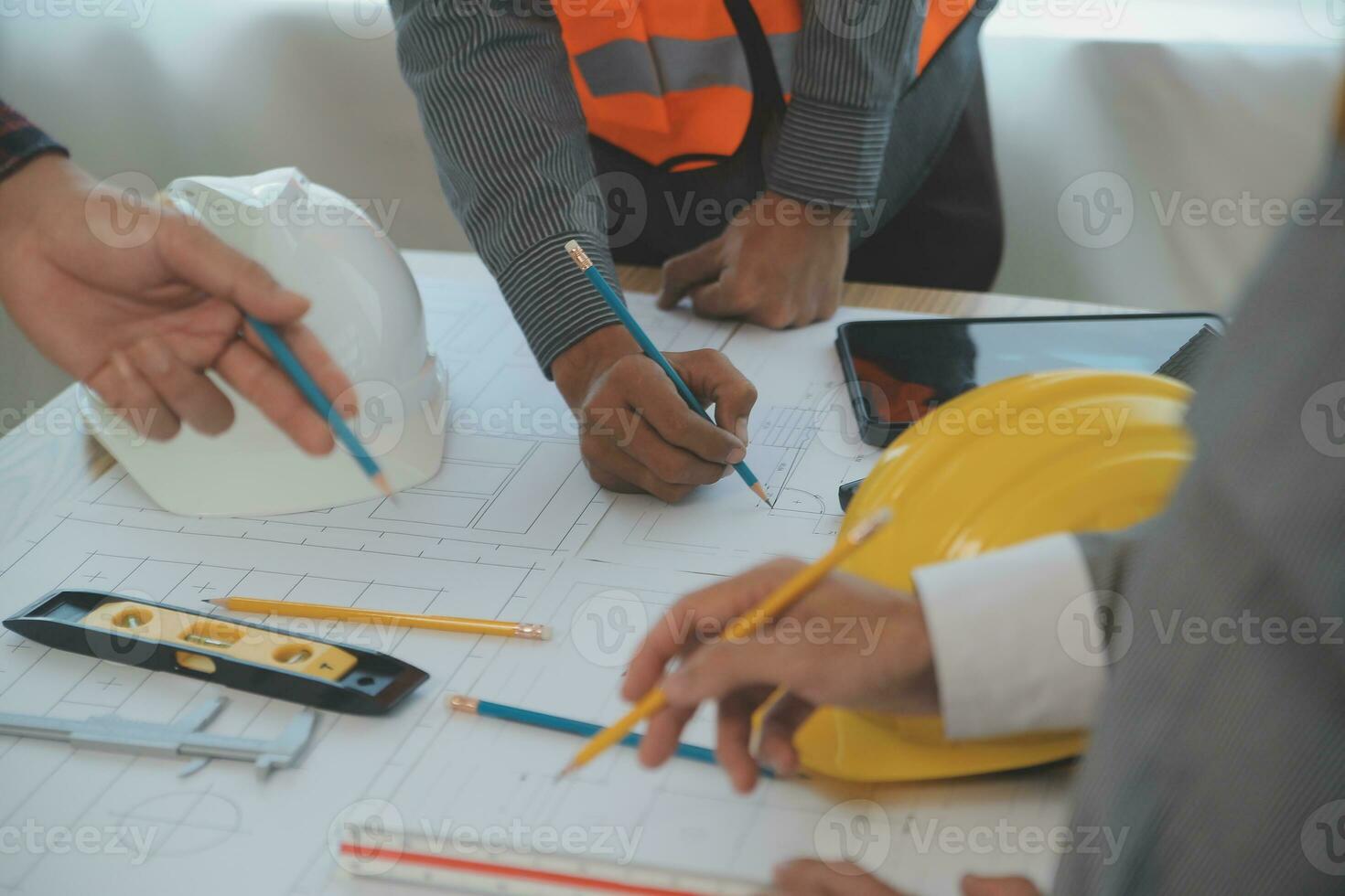 Construction and structure concept of Engineer or architect meeting for project working with partner and engineering tools on model building and blueprint in working site, contract for both companies. photo