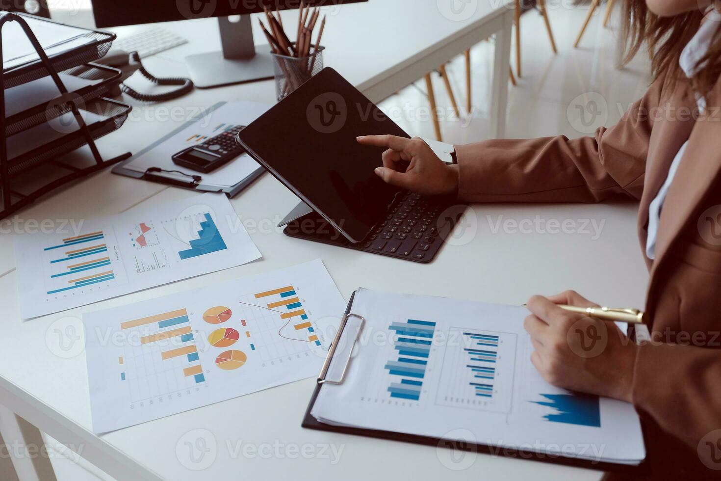Business Documents, Auditor businesswoman checking searching document legal prepare paperwork or report for analysis TAX time,accountant Documents data contract partner deal in workplace office photo