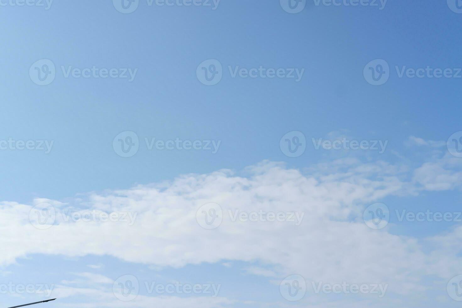 Blue sky background with white clouds photo