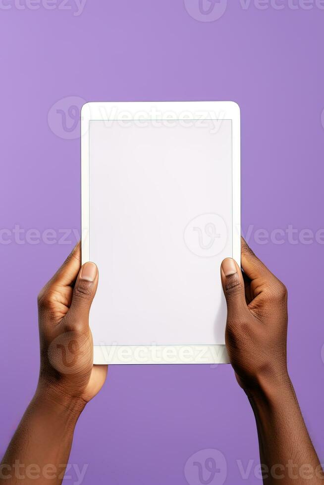 Hand holding tablet with mockup blank screen isolated on purple background. ai generated photo