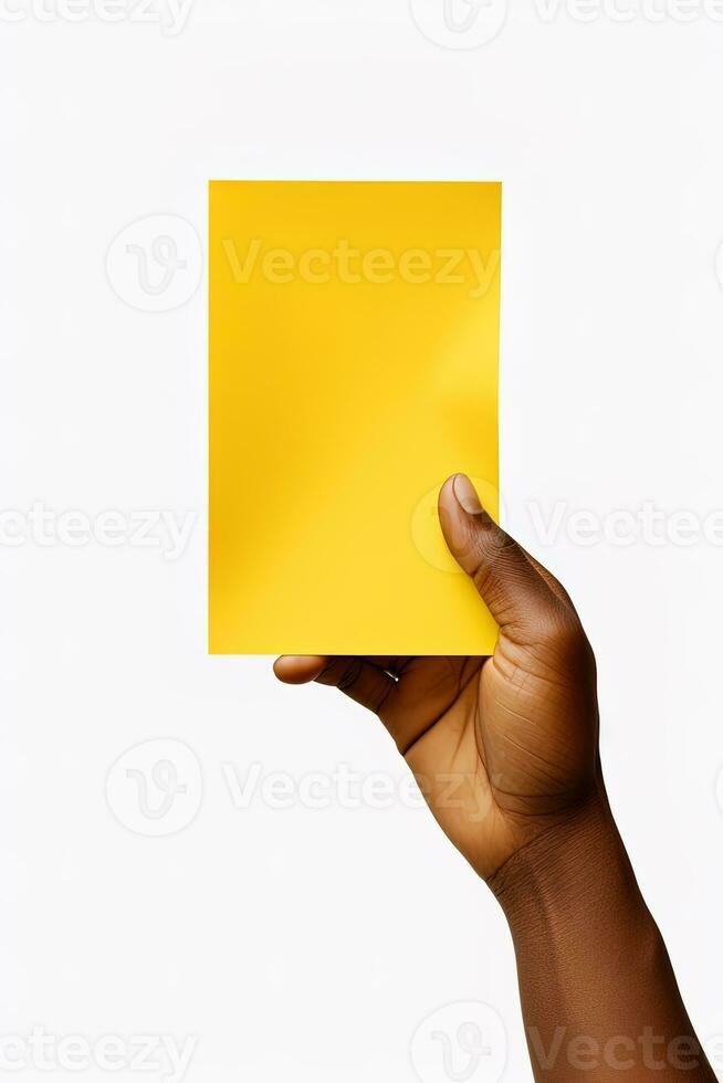 A human hand holding a blank sheet of yellow paper or card isolated on white background. ai generated photo