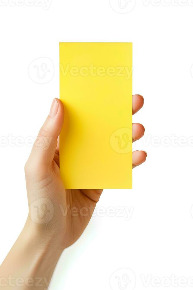 A human hand holding a blank sheet of yellow paper or card isolated on white background. ai generated photo