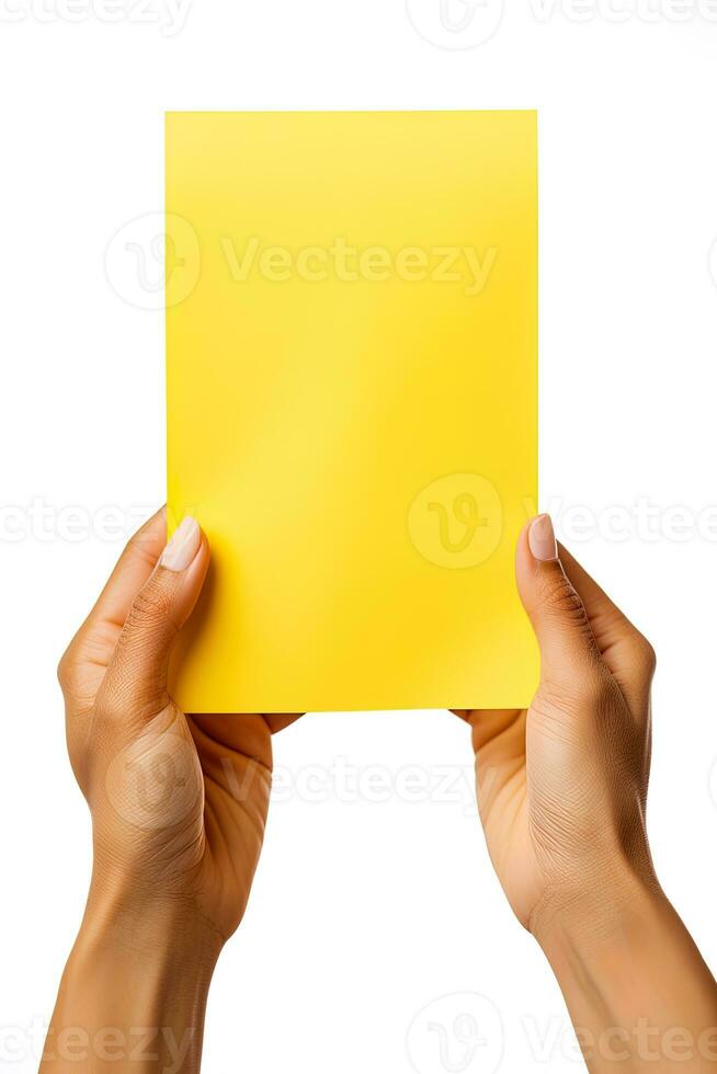 A human hand holding a blank sheet of yellow paper or card isolated on white background. ai generated photo