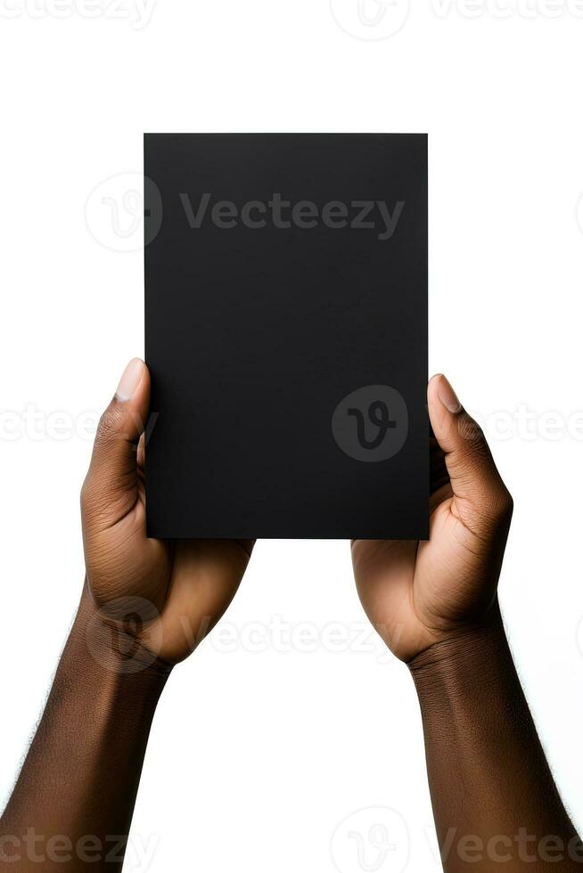 A human hand holding a blank sheet of black paper or card isolated on white background. ai generated photo