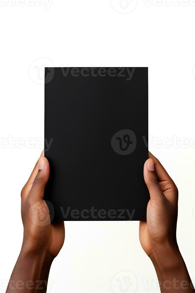 A human hand holding a blank sheet of black paper or card isolated on white background. ai generated photo