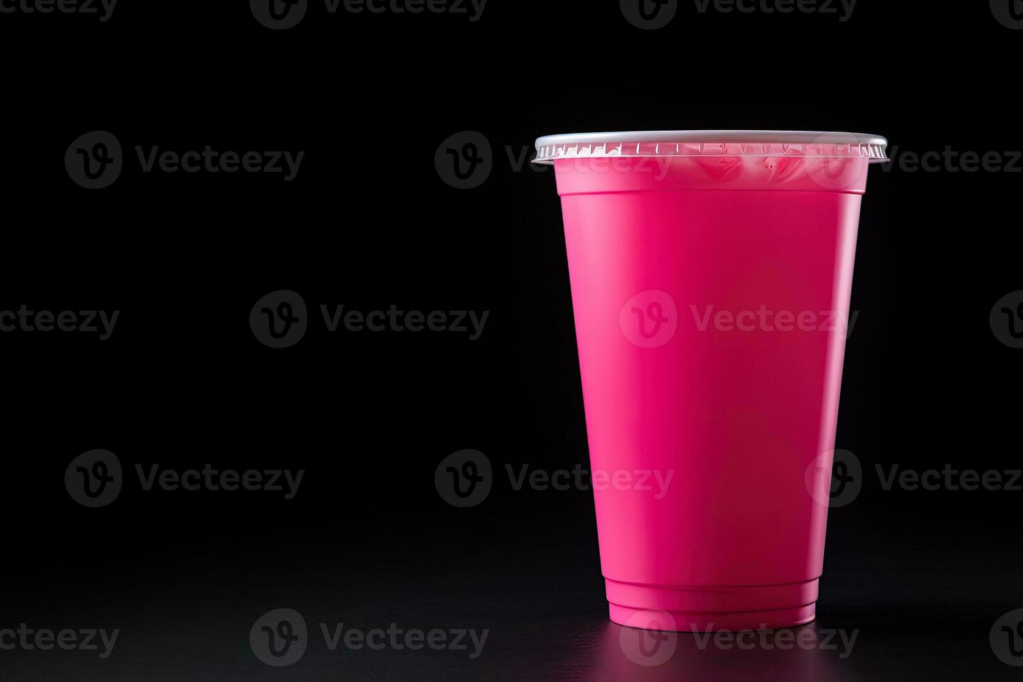 rosado bebida en el plastico taza aislado en negro antecedentes. tomar lejos bebidas concepto con Copiar espacio. ai generado foto