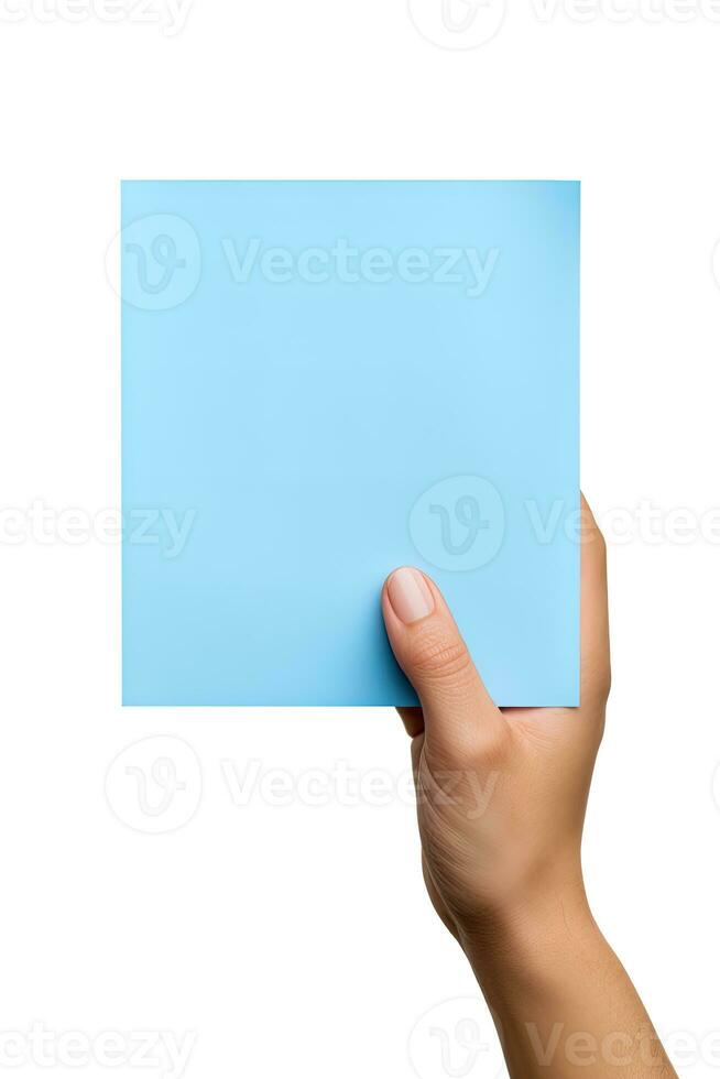 A human hand holding a blank sheet of blue paper or card isolated on white background. ai generated photo