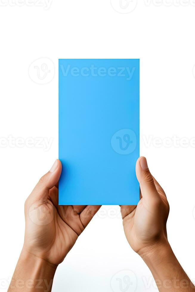 A human hand holding a blank sheet of blue paper or card isolated on white background. ai generated photo
