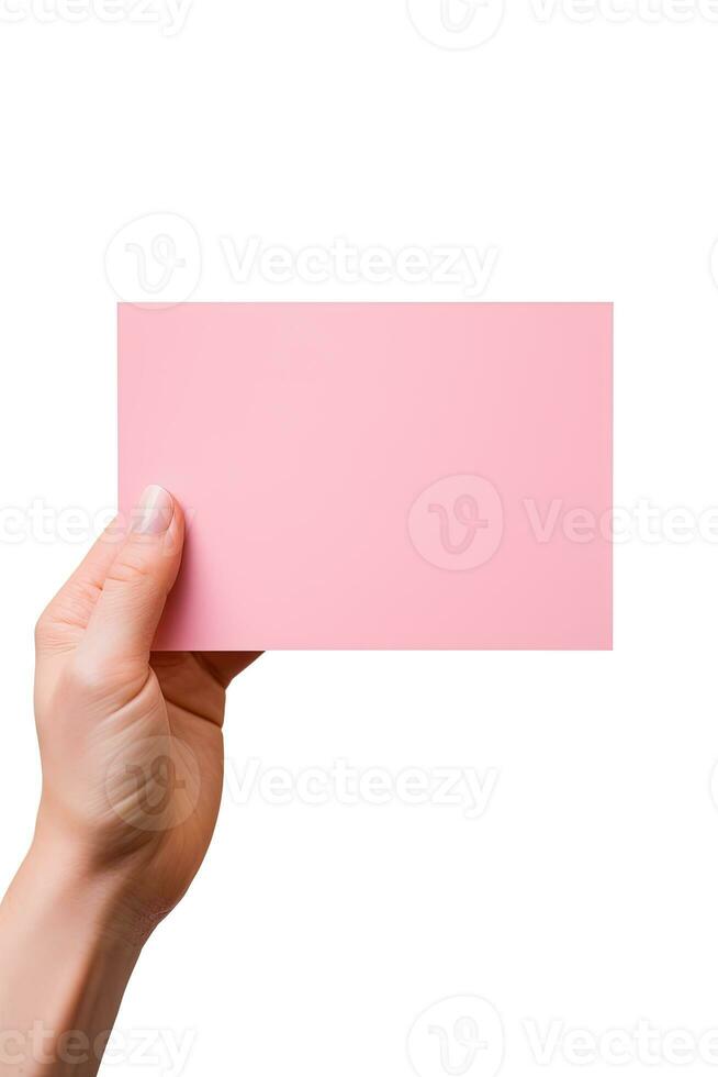 A human hand holding a blank sheet of pink paper or card isolated on a white background. ai generated photo