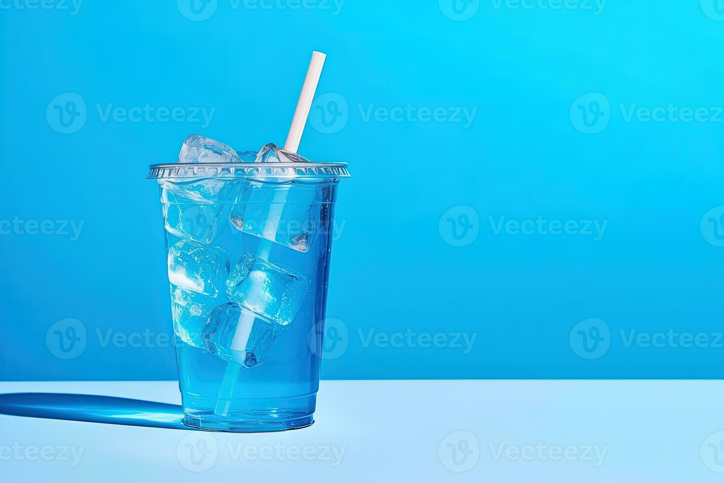 Blue drink in a plastic cup isolated on a blue background. Take away drinks concept with copy space. ai generated photo