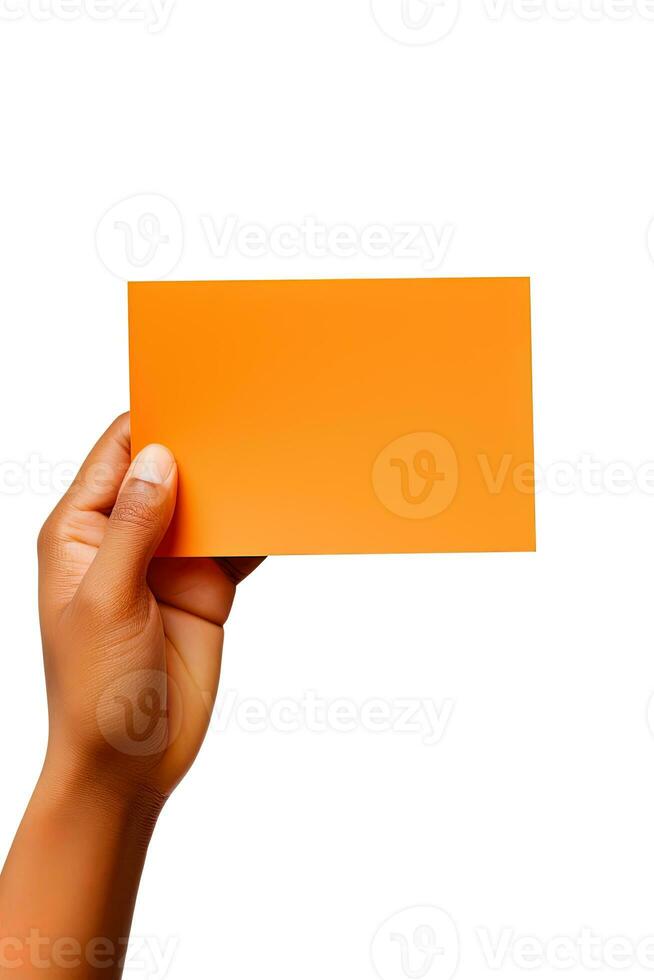 A human hand holding a blank sheet of orange paper or card isolated on a white background. ai generated photo