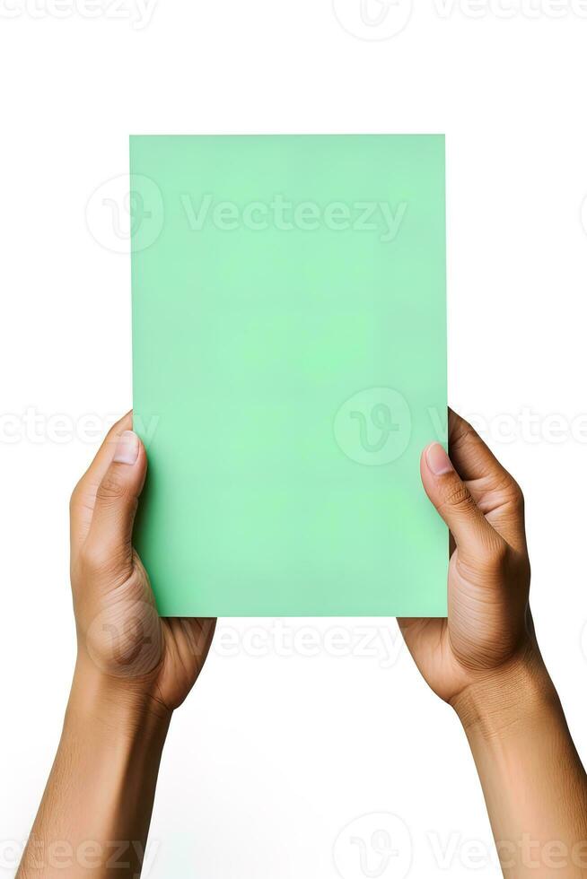 A human hand holding a blank sheet of green paper or card isolated on a white background. ai generated photo