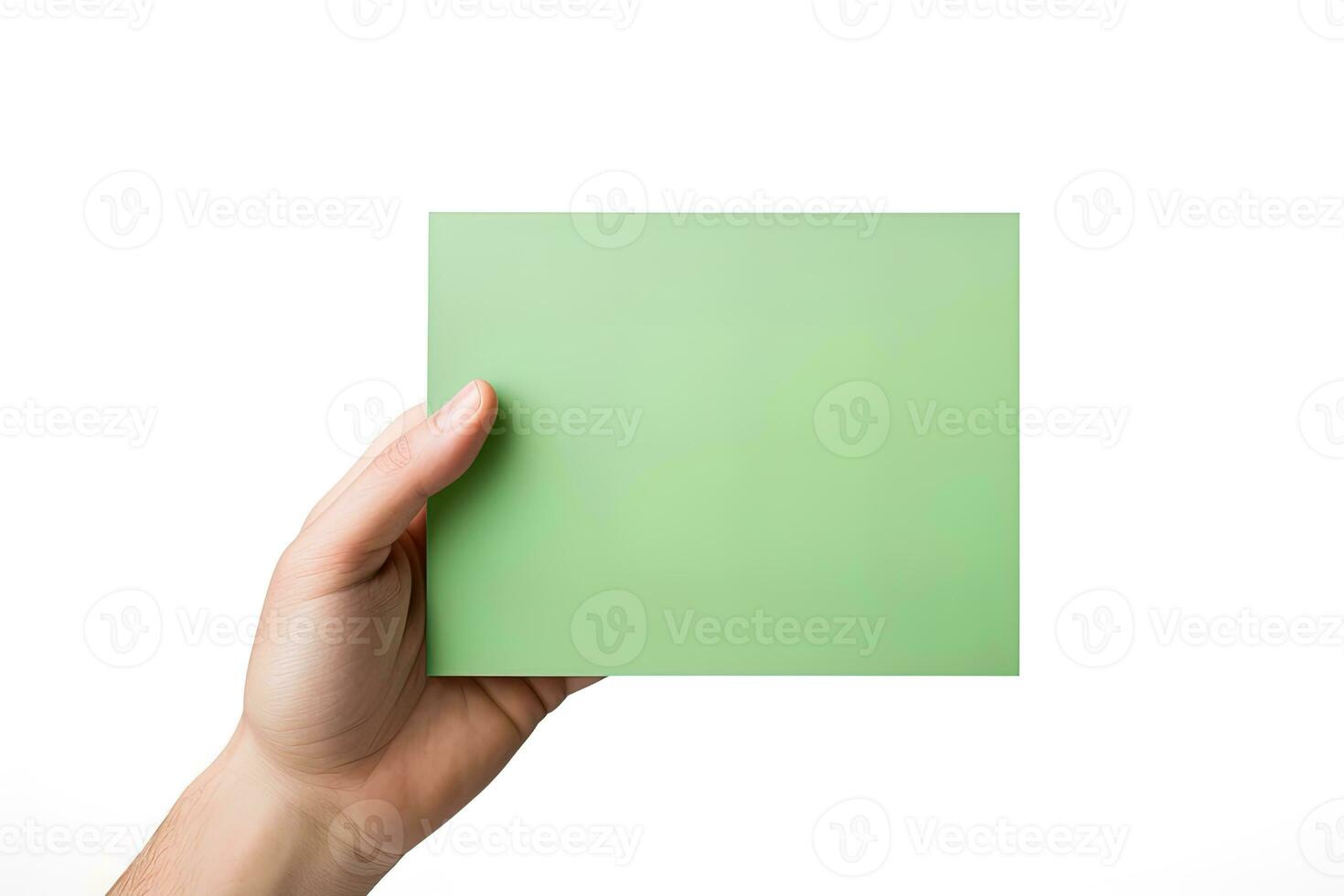 A human hand holding a blank sheet of green paper or card isolated on a white background. ai generated photo