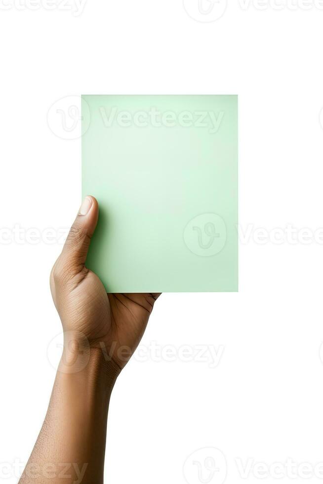 A human hand holding a blank sheet of green paper or card isolated on a white background. ai generated photo