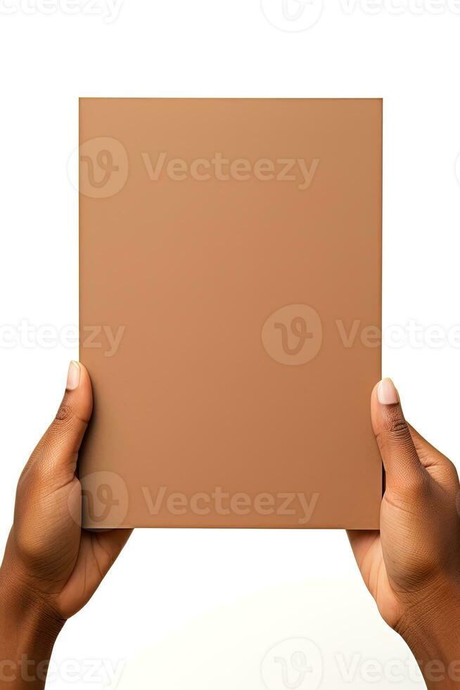 A human hand holding a blank sheet of brown paper or card isolated on a white background. ai generated photo