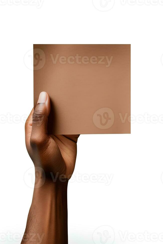 A human hand holding a blank sheet of brown paper or card isolated on a white background. ai generated photo