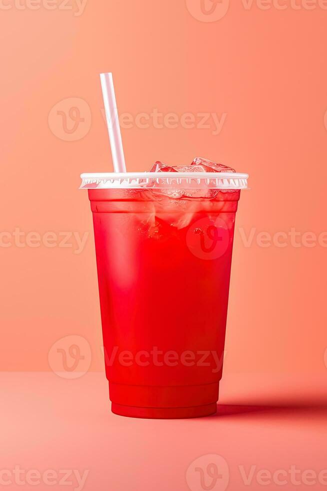 Red drink in a plastic cup isolated on a red pastel background. Take away drinks concept. ai generated photo
