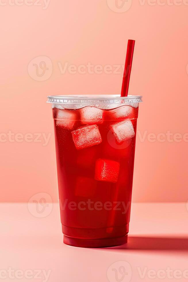 Red drink in a plastic cup isolated on a red pastel background. Take away drinks concept. ai generated photo