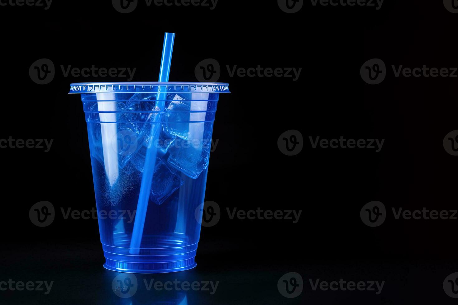 Blue drink in a plastic cup isolated on a black background. Take away drinks concept with copy space. ai generated photo