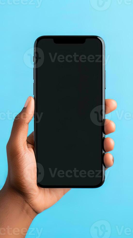 Hand holding smartphone with a black blank screen isolated on a blue background. ai generated photo