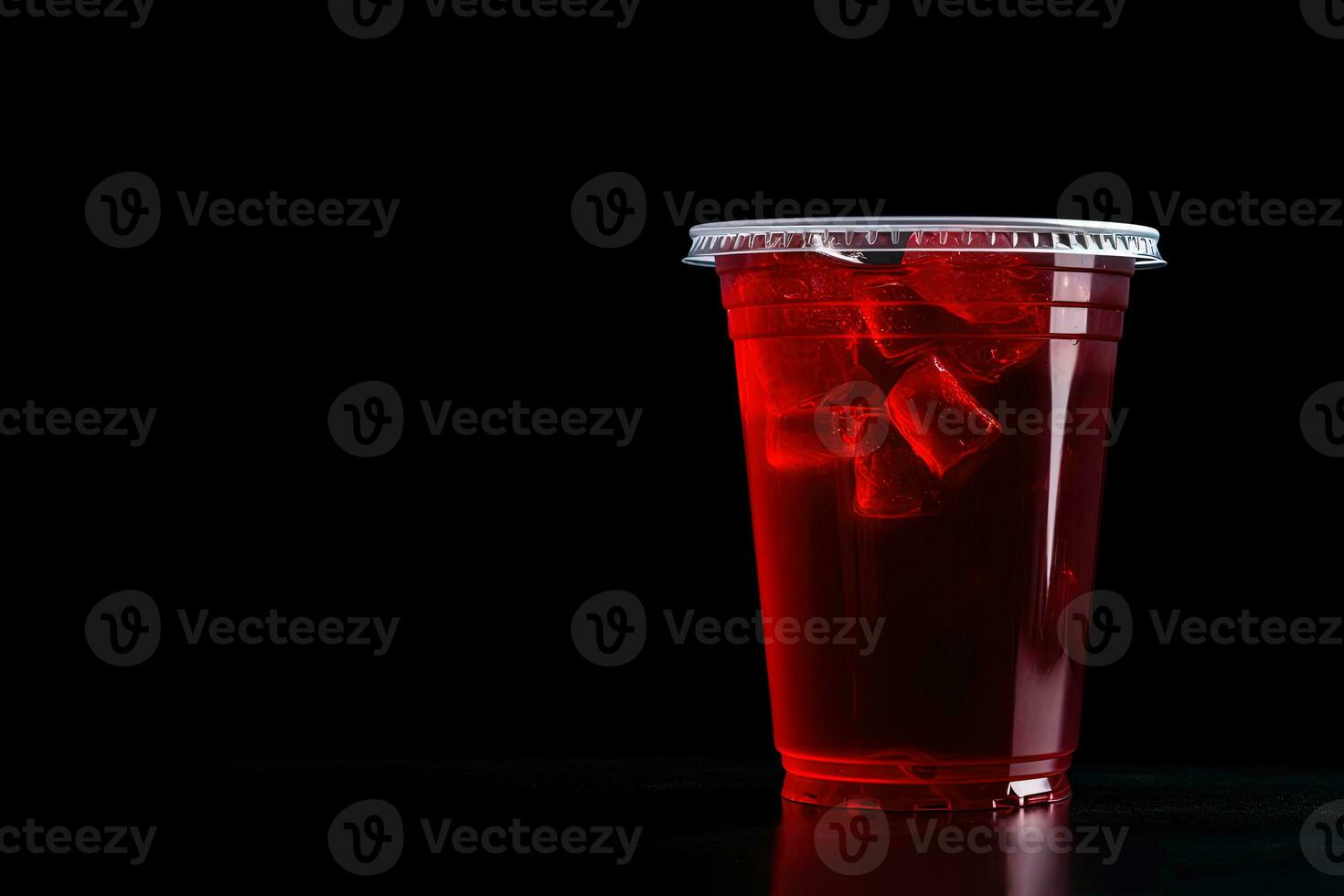 Red drink in a plastic cup isolated on a black background. Take away drinks concept with copy space. ai generated photo